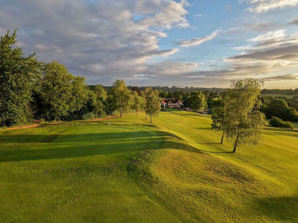 golf-club-hole-aerial-dusk